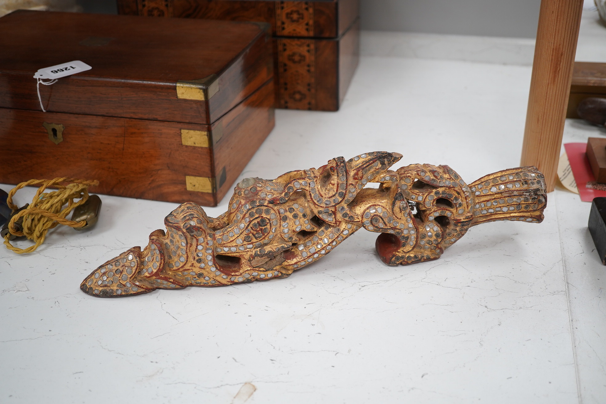 A group of African, Indonesian and other South East Asian carvings and a lacquer box. Sword 60cm long. Condition - poor, fair to good